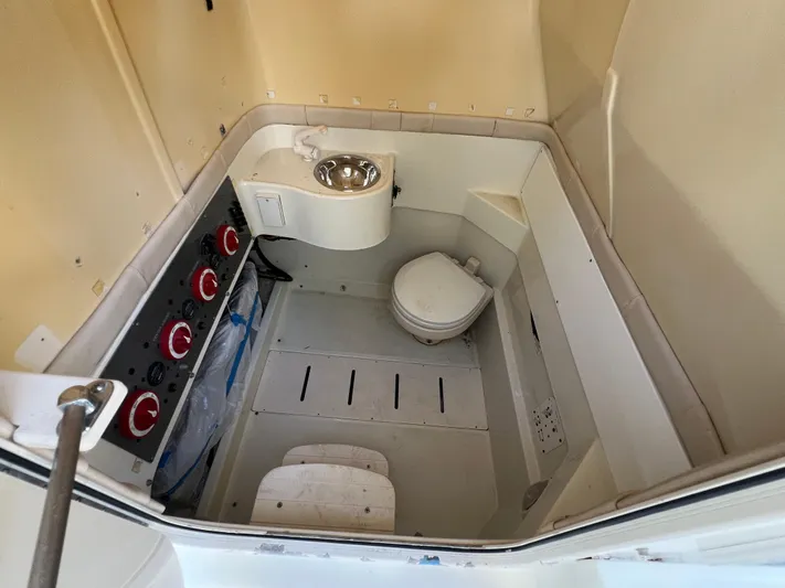  Yacht Photos Pics 2012 Hydra-Sports 3400 CC boat interior with toilet and sink.