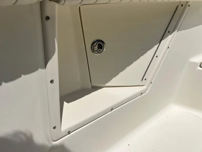  Yacht Photos Pics 2012 Hydra-Sports 3400 CC boat storage compartment with secure latch.