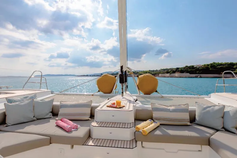  Yacht Photos Pics Luxurious 2021 Fountaine Pajot Samana 59 catamaran with spacious deck and ocean view.