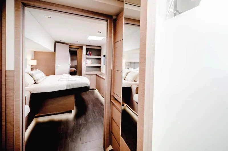  Yacht Photos Pics Luxurious cabin interior of 2021 Fountaine Pajot Samana 59 yacht, featuring modern design.