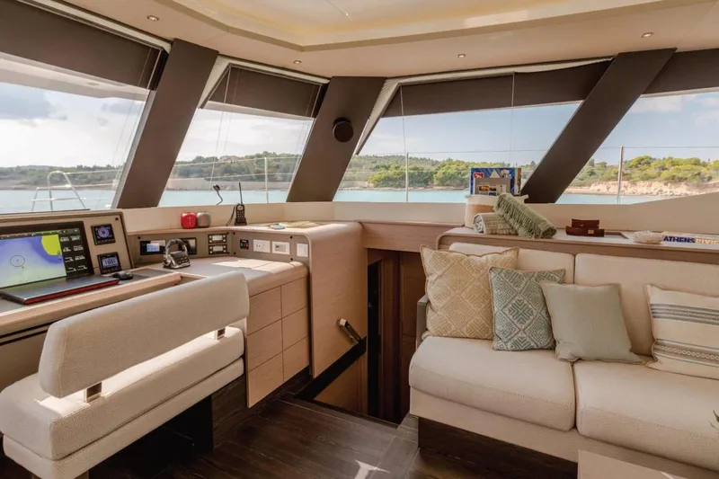  Yacht Photos Pics Luxurious interior of 2021 Fountaine Pajot Samana 59 yacht with modern navigation equipment.