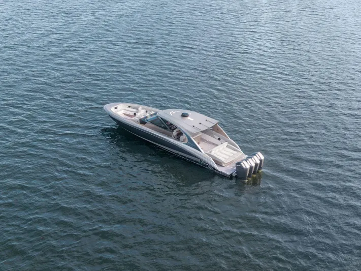  Yacht Photos Pics 2024 Mystic Powerboats M5200 luxury boat on calm water.