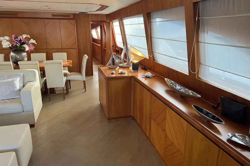  Yacht Photos Pics Luxurious interior of a 2009 Castagnola 24 yacht with elegant wood finishes.