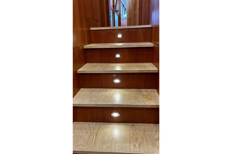  Yacht Photos Pics Wooden staircase with built-in lights on a 2009 Castagnola 24 yacht.