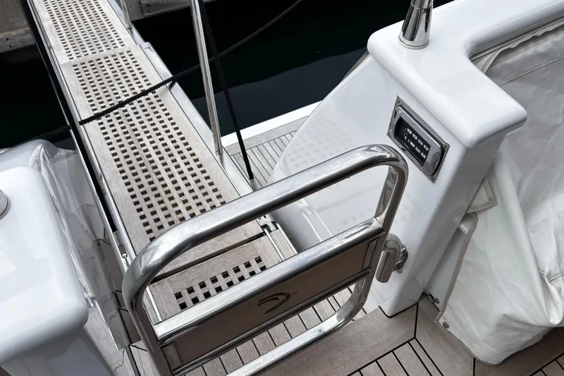  Yacht Photos Pics Luxury yacht Castagnola 24, 2009 model, featuring a sleek boarding platform and polished metal railings.