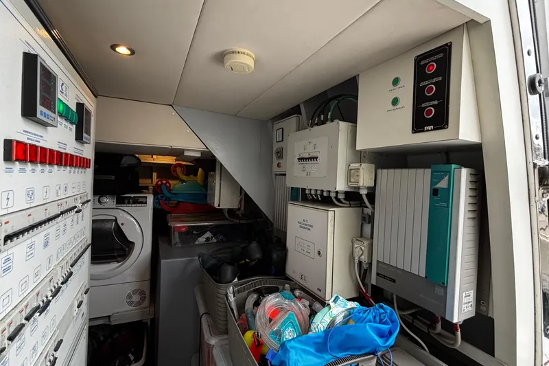  Yacht Photos Pics Electrical control room inside a 2009 Castagnola 24 yacht, featuring panels and equipment.