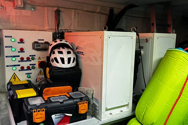  Yacht Photos Pics Engine room of 2009 Castagnola 24 yacht with tools and safety equipment.