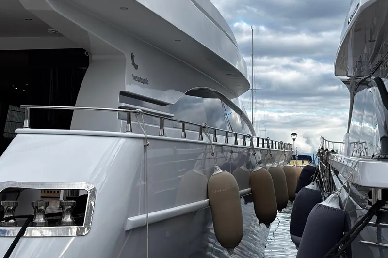  Yacht Photos Pics Luxurious 2009 Castagnola 24 yacht docked, showcasing sleek design and modern elegance.