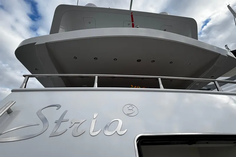  Yacht Photos Pics Luxury yacht Castagnola 24, 2009 model, with "Stria" nameplate, under cloudy sky.