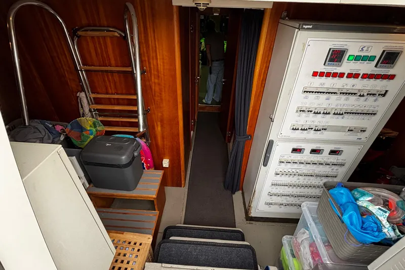  Yacht Photos Pics Interior of 2009 Castagnola 24 yacht with control panel and storage area.