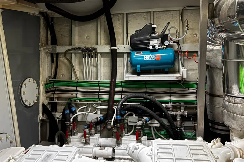  Yacht Photos Pics Engine room of 2009 Castagnola 24 yacht with Newton compressor and organized wiring.