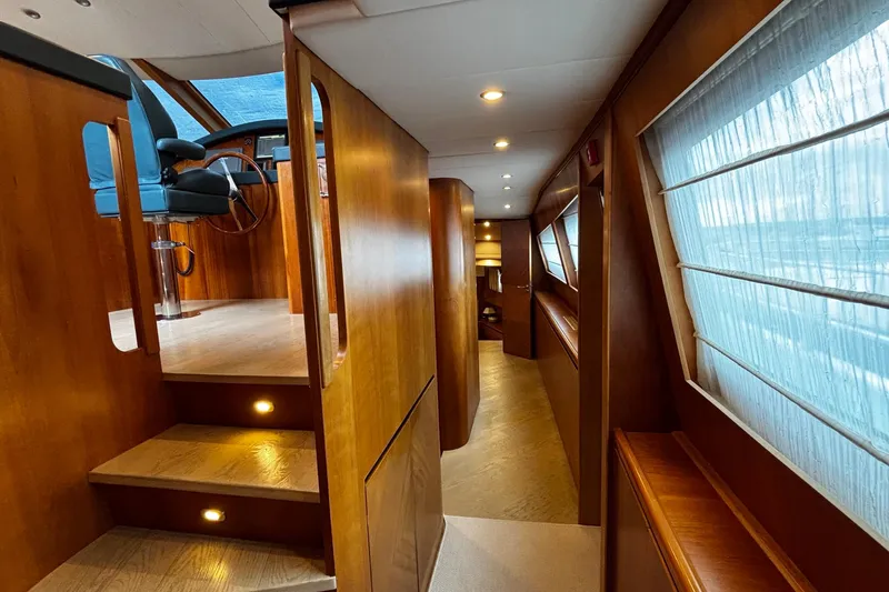  Yacht Photos Pics Luxurious interior of 2009 Castagnola 24 yacht with wooden finishes and modern design.