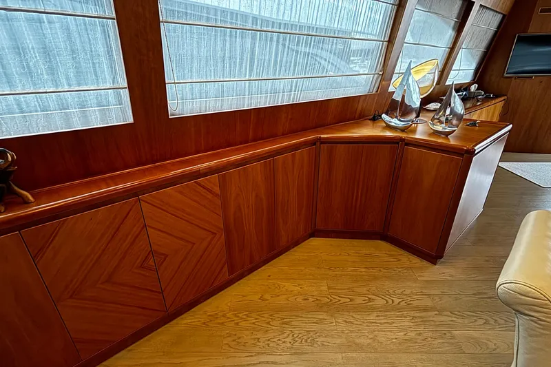  Yacht Photos Pics Luxurious wooden interior of a 2009 Castagnola 24 yacht with elegant decor.