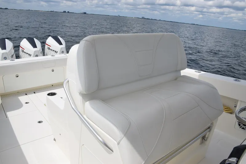  Yacht Photos Pics 2020 SeaVee 370z boat with white seating and multiple outboard engines on open water.