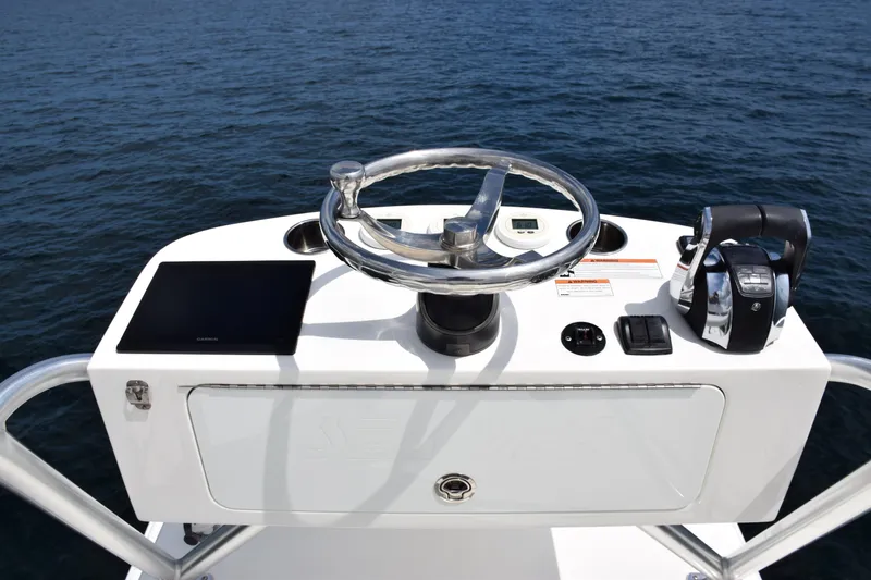  Yacht Photos Pics 2020 SeaVee 370z boat helm with steering wheel and controls on open water.