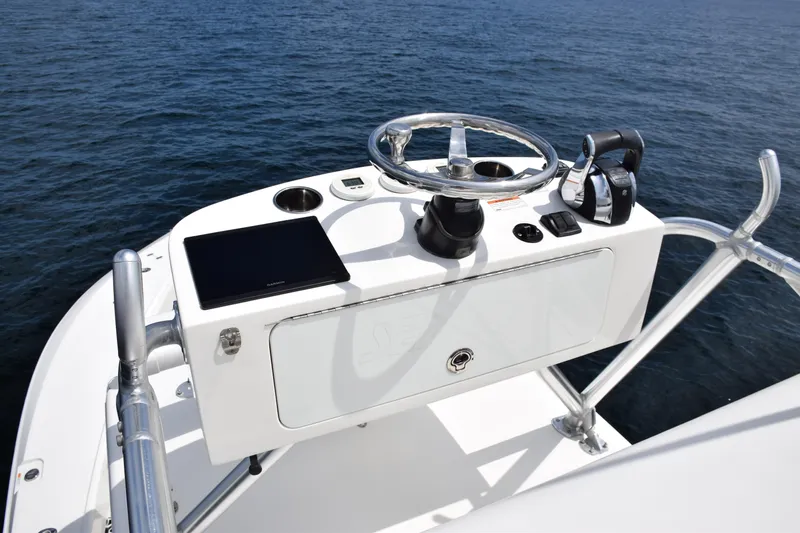  Yacht Photos Pics 2020 SeaVee 370z boat helm with steering wheel and controls on open water.