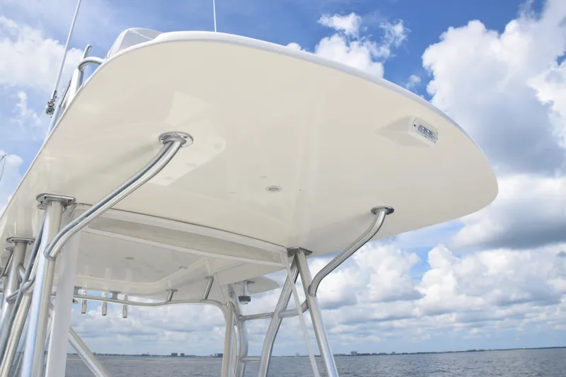  Yacht Photos Pics 2020 SeaVee 370z boat with T-top against blue sky and clouds.