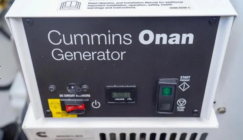 Great Adventure Yacht Photos Pics Cummins Onan generator control panel on a 2014 Lagoon 450 yacht.