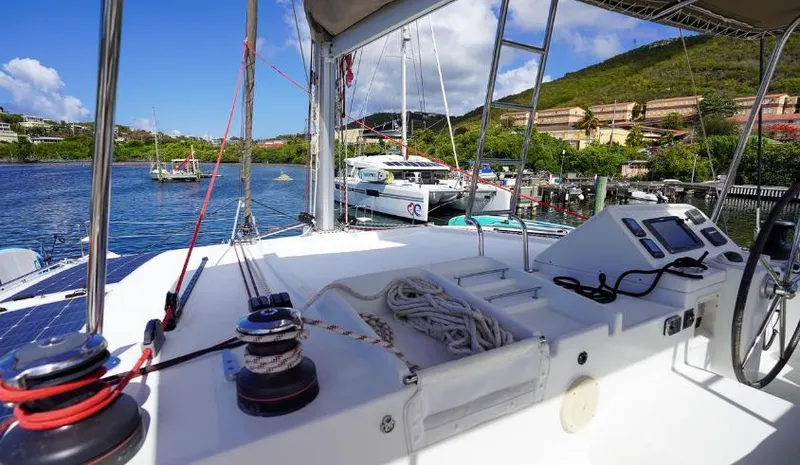 Great Adventure Yacht Photos Pics Lagoon 450 catamaran docked in a scenic marina, 2014 model.