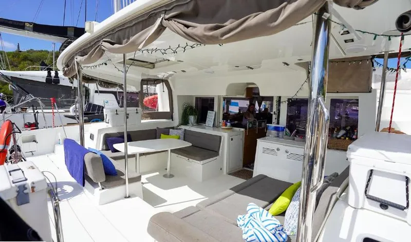 Great Adventure Yacht Photos Pics Spacious 2014 Lagoon 450 catamaran interior with comfortable seating and modern amenities.