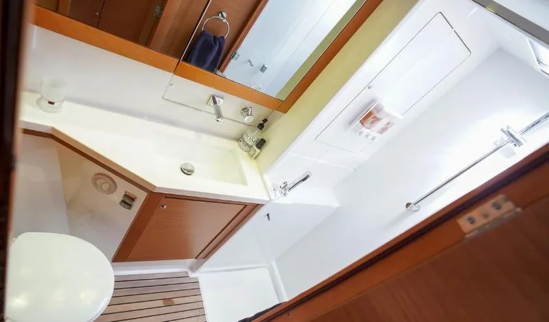 Great Adventure Yacht Photos Pics Modern bathroom interior in 2014 Lagoon 450 yacht, featuring sleek design and wooden accents.