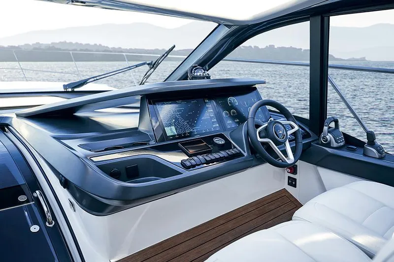  Yacht Photos Pics Helm of 2021 Princess V50 Open yacht with modern navigation system and luxurious seating.