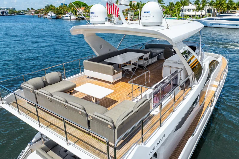  Yacht Photos Pics Luxurious 2021 Azimut Fly 72 yacht with spacious deck and elegant seating on the water.