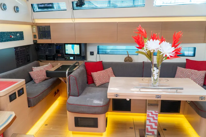  Yacht Photos Pics Luxurious interior of 2018 Amel 50 yacht with modern seating and vibrant decor.