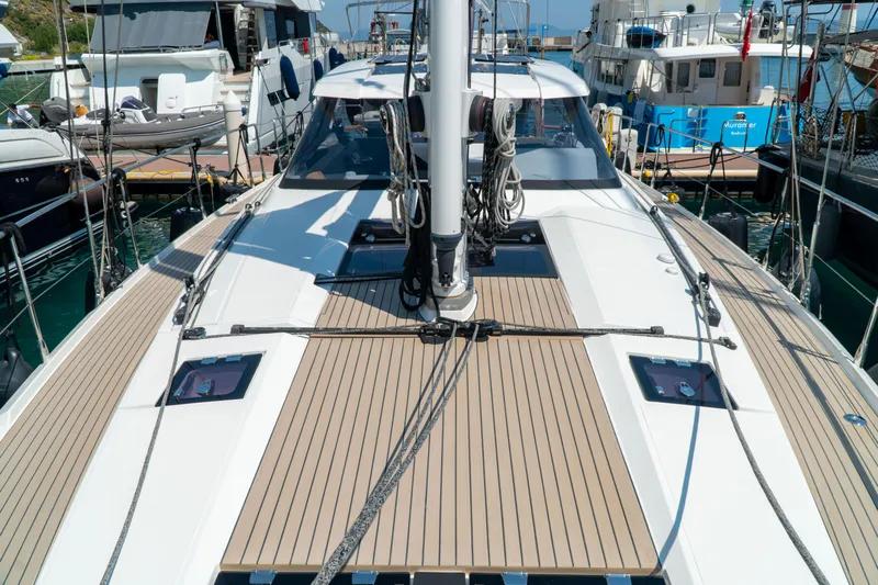  Yacht Photos Pics Sleek 2018 Amel 50 yacht docked at marina, showcasing modern deck design.