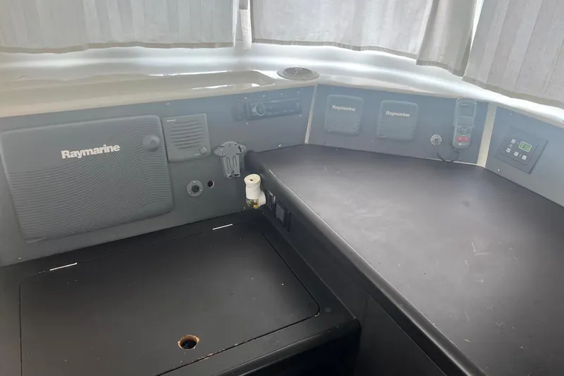 Queen Butterfly Yacht Photos Pics Interior of 2006 Lagoon 440 yacht with Raymarine navigation equipment.