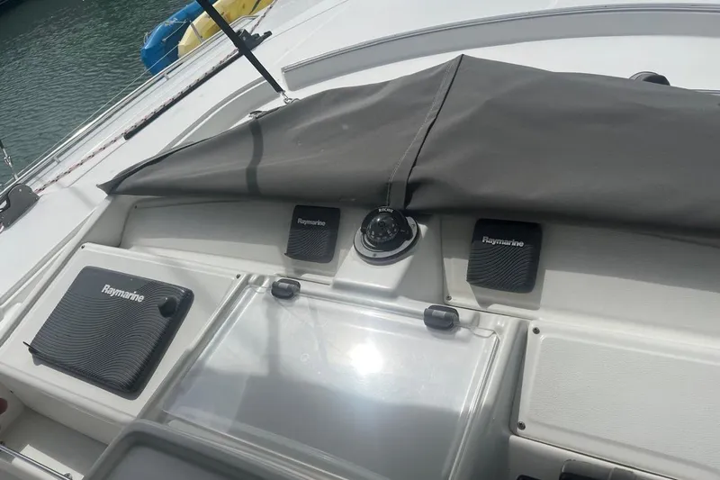 Queen Butterfly Yacht Photos Pics Control panel of a 2006 Lagoon 440 catamaran with Raymarine equipment.