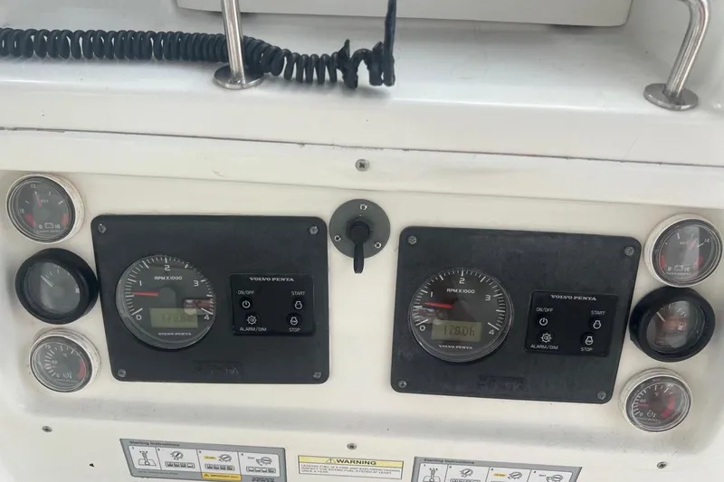 Queen Butterfly Yacht Photos Pics Control panel of a 2006 Lagoon 440 catamaran with Volvo Penta gauges and controls.