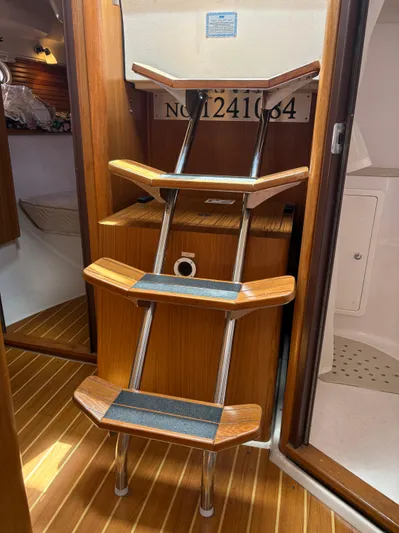 Carolina Wind Yacht Photos Pics Interior of 2011 Catalina 355 sailboat with wooden steps and cabin entry.