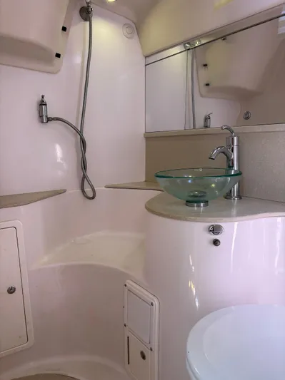 Carolina Wind Yacht Photos Pics Modern bathroom in 2011 Catalina 355 yacht with glass sink and shower.