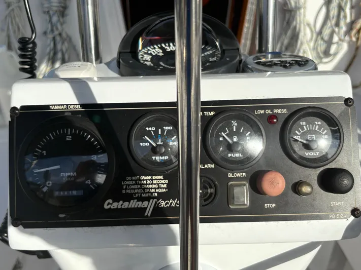 Carolina Wind Yacht Photos Pics Control panel of a 2011 Catalina 355 yacht with gauges and switches.