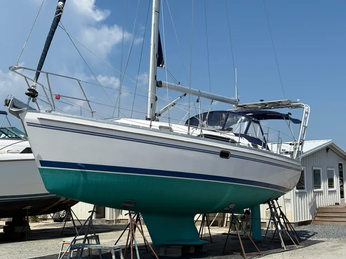 Carolina Wind Yacht Photos Pics 2011 Catalina 355 sailboat on dry dock under clear blue sky.