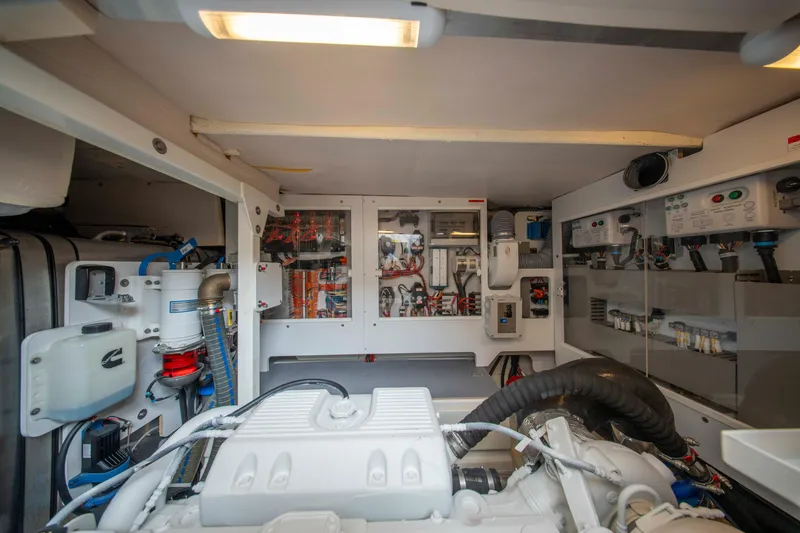 Seeworthy Yacht Photos Pics Engine room of a 2018 Prestige 560 yacht, showcasing mechanical and electrical systems.