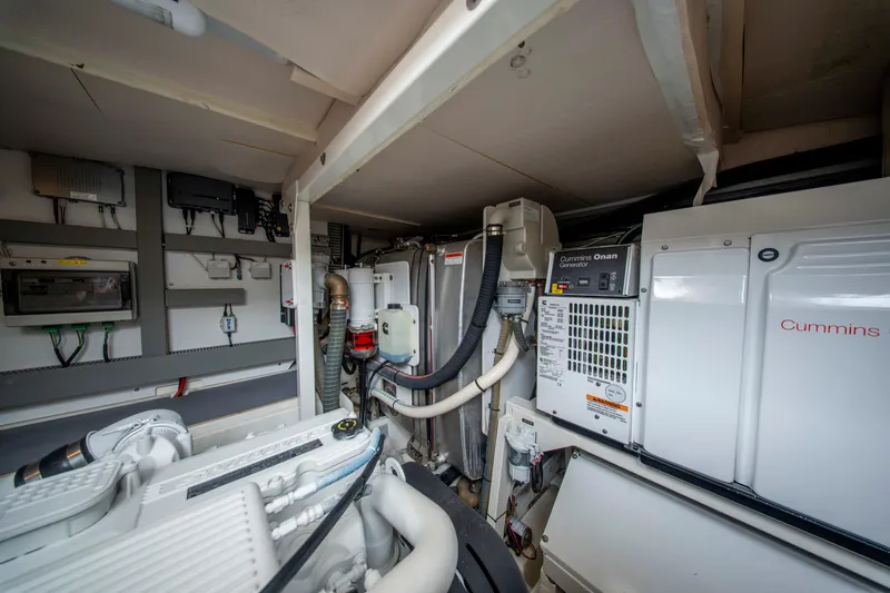 Seeworthy Yacht Photos Pics Engine room of a 2018 Prestige 560 yacht with Cummins Onan generator.