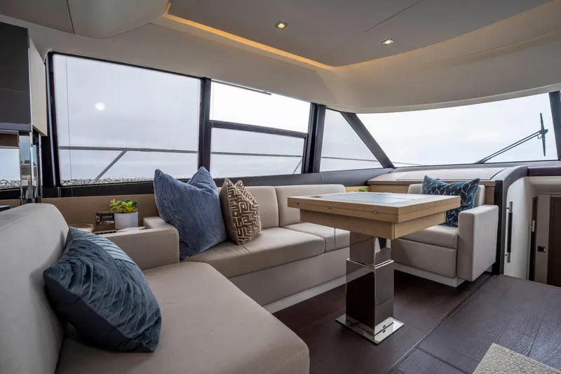 Seeworthy Yacht Photos Pics Luxurious interior of 2018 Prestige 560 yacht with elegant seating and modern decor.