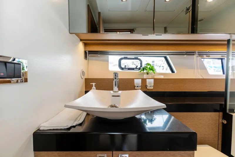 Seeworthy Yacht Photos Pics Luxurious bathroom interior of 2018 Prestige 560 yacht with modern sink and sleek design.
