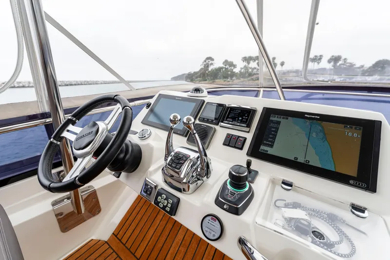 Seeworthy Yacht Photos Pics 2018 Prestige 560 yacht helm with advanced navigation and control systems.