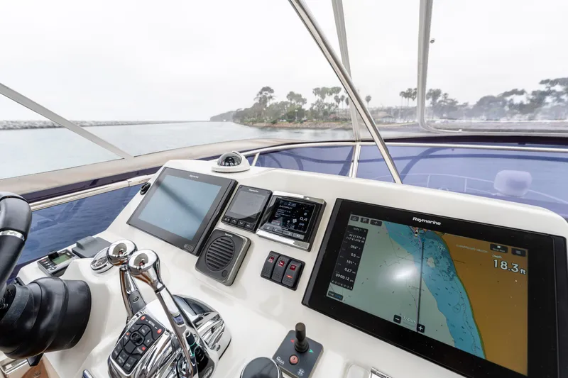 Seeworthy Yacht Photos Pics Helm of 2018 Prestige 560 yacht with navigation screens and controls.
