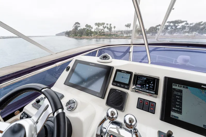 Seeworthy Yacht Photos Pics Cockpit view of 2018 Prestige 560 yacht with advanced navigation systems.
