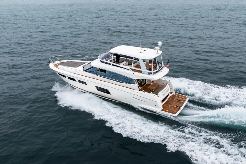 Seeworthy Yacht Photos Pics 2018 Prestige 560 yacht cruising on open water, showcasing sleek design and luxury features.