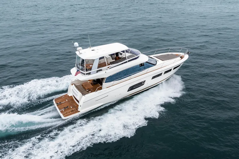 Seeworthy Yacht Photos Pics 2018 Prestige 560 yacht cruising on open water, showcasing sleek design and luxury features.