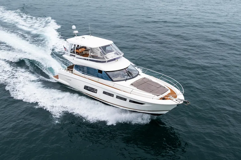 Seeworthy Yacht Photos Pics 2018 Prestige 560 yacht cruising on open water, showcasing sleek design and luxury features.