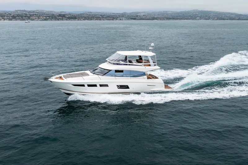 Seeworthy Yacht Photos Pics 2018 Prestige 560 yacht cruising on open water, showcasing sleek design and luxury features.