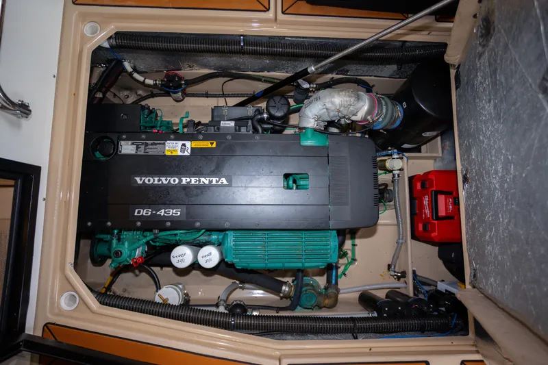 Halcyon Yacht Photos Pics Engine compartment of 2016 Cutwater 30 CB featuring Volvo Penta D6-435 engine.