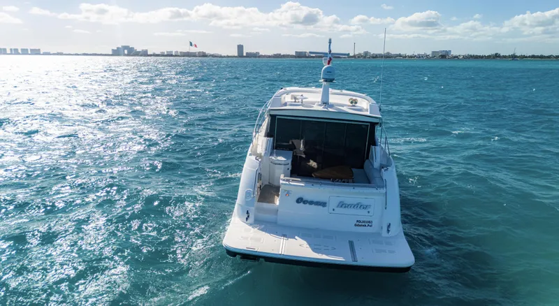  Yacht Photos Pics 2018 Sea Ray L590 yacht cruising on open blue water.