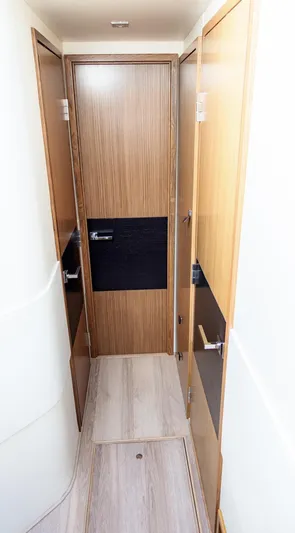  Yacht Photos Pics 2018 Sea Ray L590 yacht interior hallway with wooden doors and modern design.